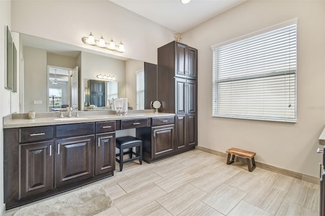 bathroom featuring vanity and a wealth of natural light