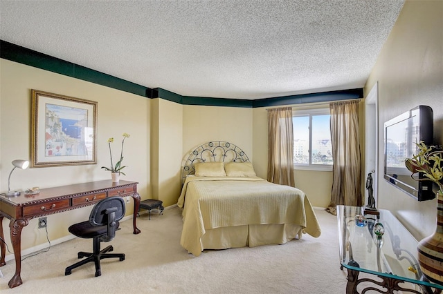 1651 Sand Key Estates Ct Unit 52, Clearwater, FL 33767 - carpeted bedroom featuring a textured ceiling