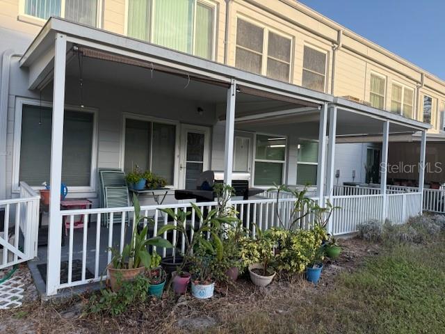 2100 World Parkway Blvd Unit 14, Clearwater, FL 33763 - back of property with covered porch