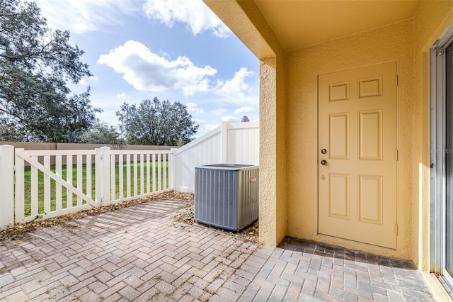 view of patio featuring cooling unit