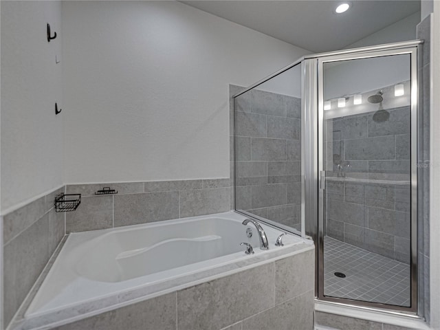 232 Samantha Ave, Auburndale, FL 33823 - bathroom with a garden tub and a shower stall
