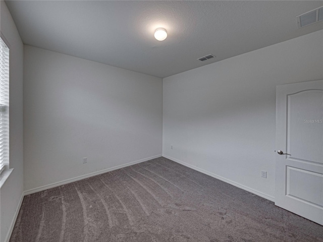 232 Samantha Ave, Auburndale, FL 33823 - carpeted spare room featuring baseboards and healthy amount of natural light