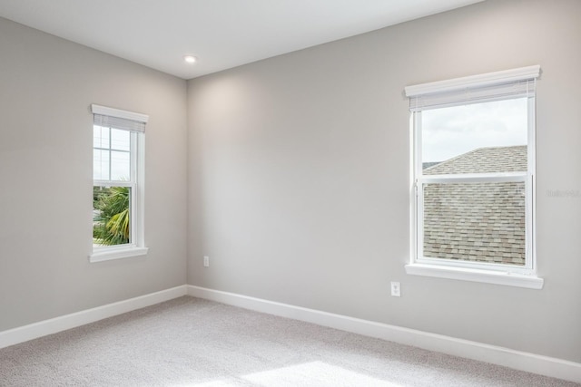 spare room featuring carpet flooring