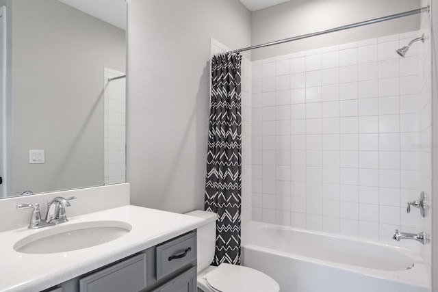 full bathroom with toilet, vanity, and shower / bath combo with shower curtain