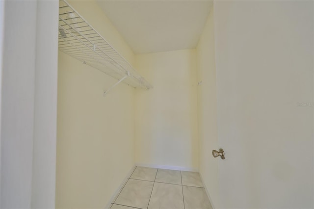 walk in closet featuring light tile patterned floors