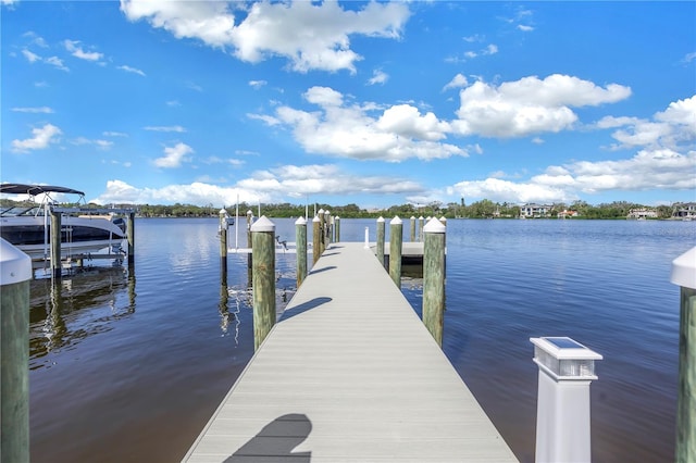 view of dock with a water view