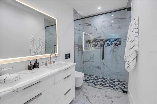 bathroom featuring a shower with door, vanity, and toilet