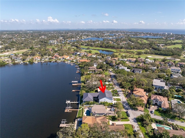 bird's eye view with a water view and a residential view