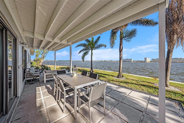 view of patio / terrace with a water view