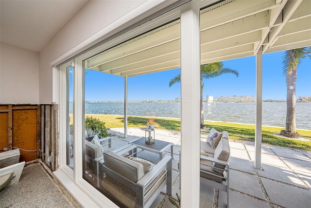 view of patio featuring a water view