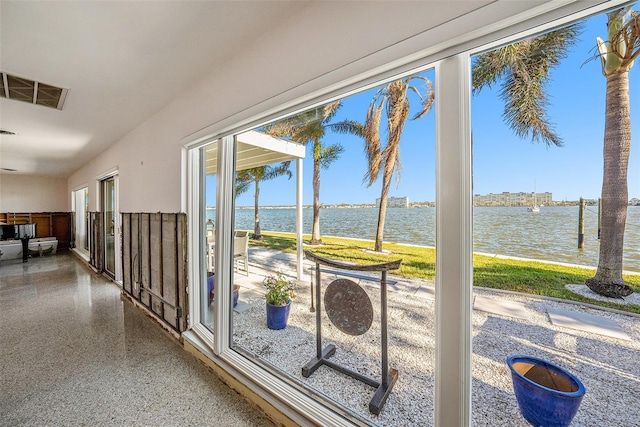 hallway featuring a water view