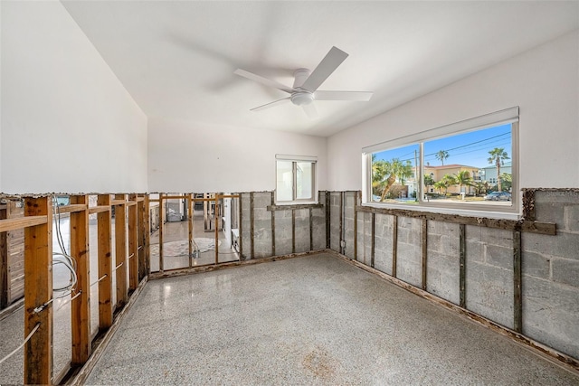 unfurnished room featuring ceiling fan