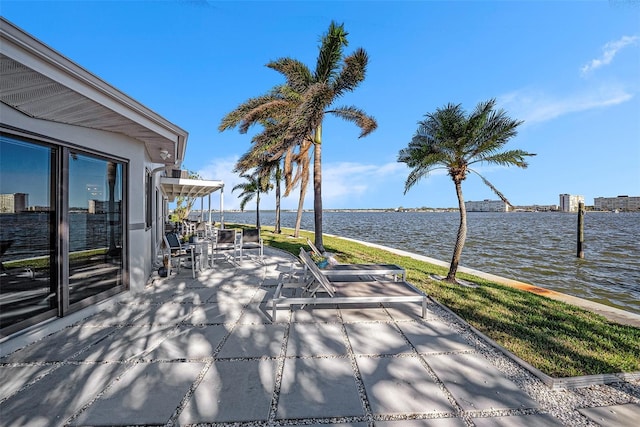 view of patio / terrace with a water view