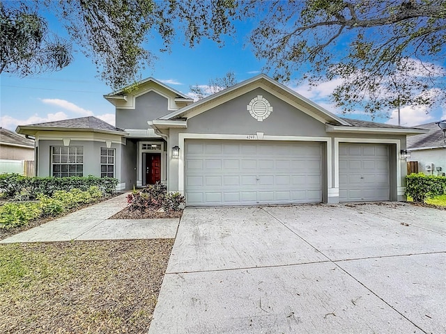 view of front of home with a garage