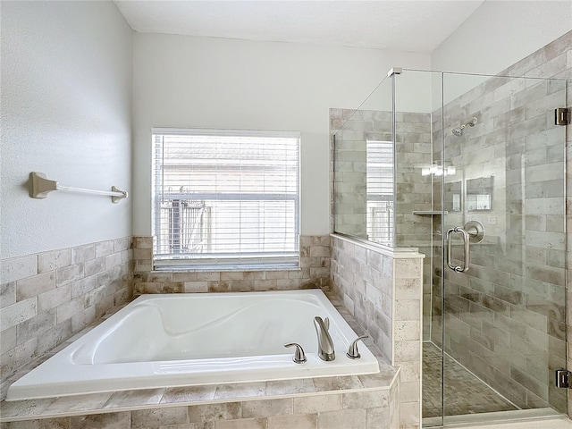 bathroom with independent shower and bath