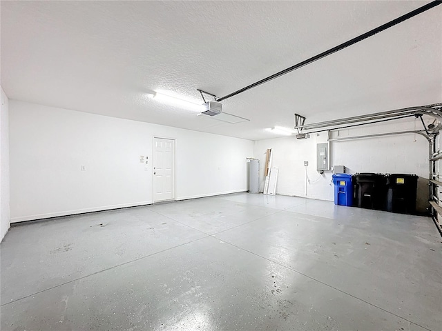 garage with a garage door opener, electric panel, and water heater