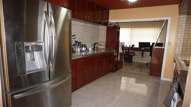 kitchen with light tile patterned flooring and stainless steel fridge with ice dispenser