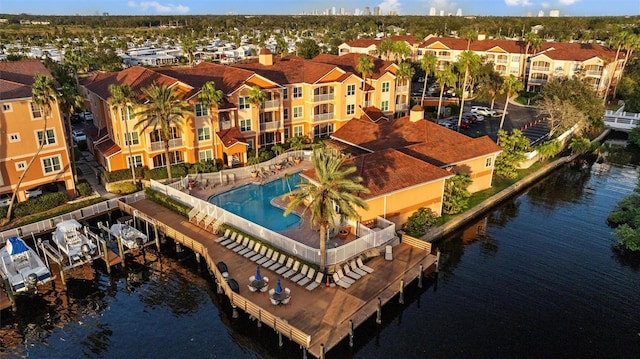 5000 Culbreath Key Way Unit 4-206, Tampa, FL 33611 - aerial perspective of suburban area featuring a pool area and a large body of water