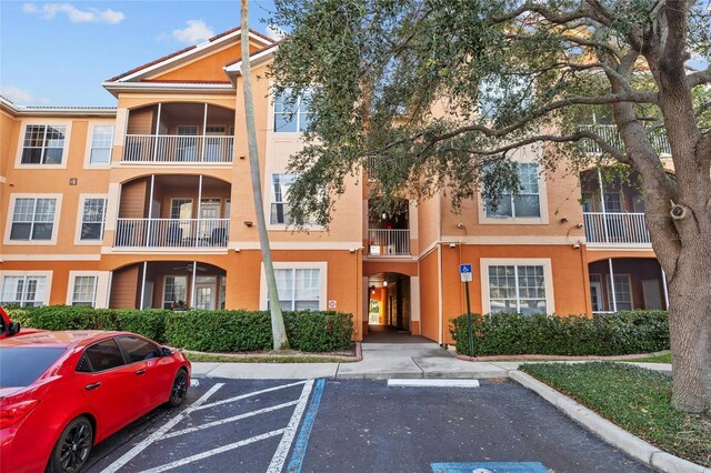 5000 Culbreath Key Way Unit 4-206, Tampa, FL 33611 - view of apartment building / complex with uncovered parking