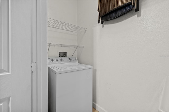 clothes washing area featuring washer / clothes dryer