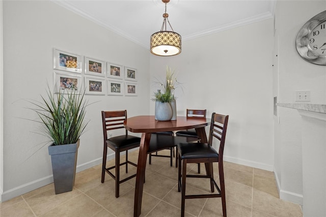 tiled dining space with ornamental molding