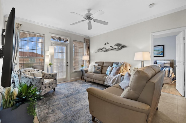 5000 Culbreath Key Way Unit 4-206, Tampa, FL 33611 - living area featuring a ceiling fan, crown molding, and baseboards