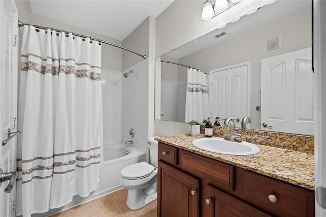 full bathroom featuring toilet, vanity, tile patterned floors, and shower / tub combo with curtain