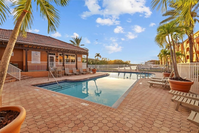 view of swimming pool with a patio area