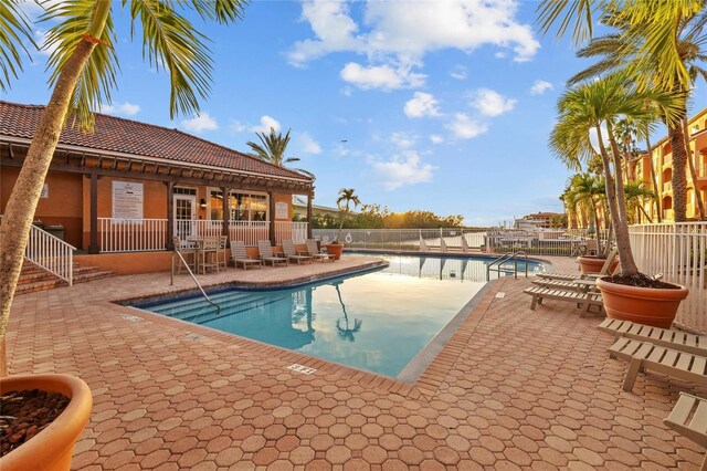 5000 Culbreath Key Way Unit 4-206, Tampa, FL 33611 - community pool featuring a patio area