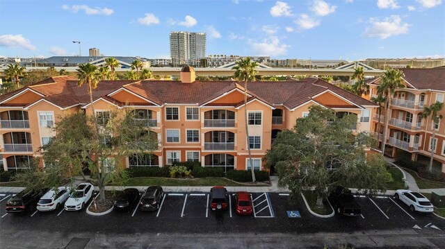 5000 Culbreath Key Way Unit 4-206, Tampa, FL 33611 - view of building exterior with uncovered parking