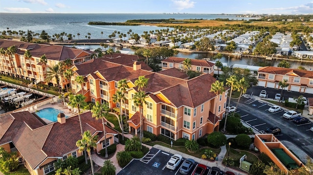 drone / aerial view with a water view