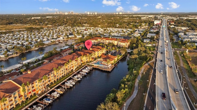 drone / aerial view featuring a water view