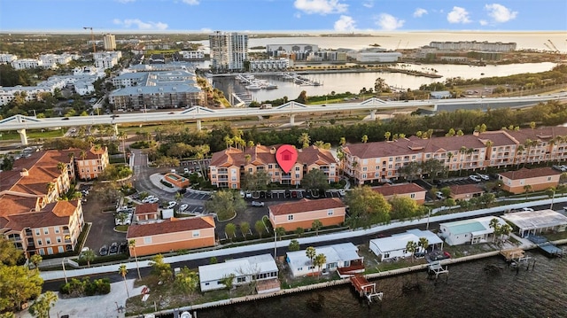 birds eye view of property featuring a water view