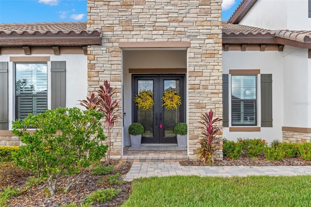 doorway to property with french doors