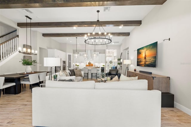 living room with beam ceiling