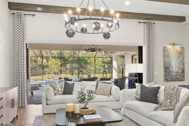 living room featuring a notable chandelier, hardwood / wood-style flooring, and beam ceiling