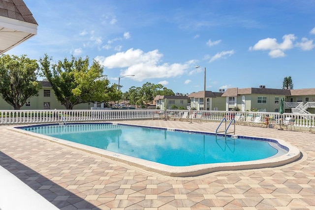 view of pool with a patio