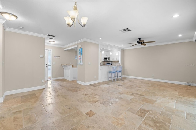 unfurnished living room featuring ceiling fan with notable chandelier and crown molding