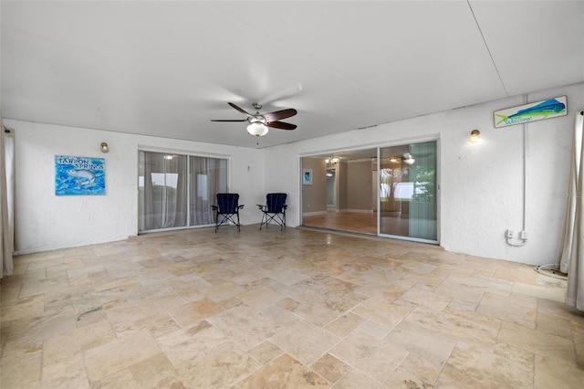 view of patio with ceiling fan