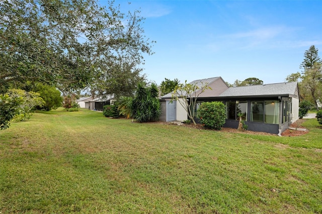 view of yard featuring a sunroom