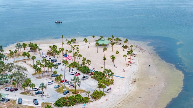 drone / aerial view with a view of the beach and a water view