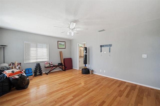 misc room featuring light wood-type flooring and ceiling fan