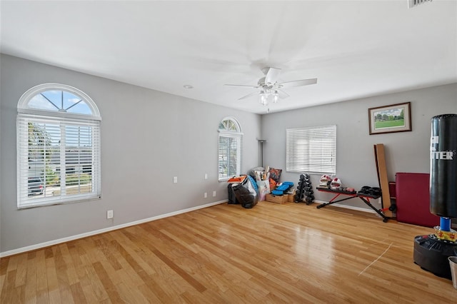 playroom featuring ceiling fan and light hardwood / wood-style floors