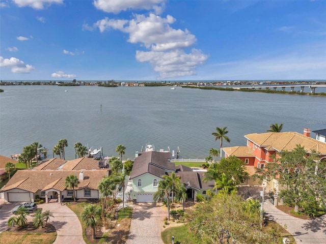 birds eye view of property featuring a water view