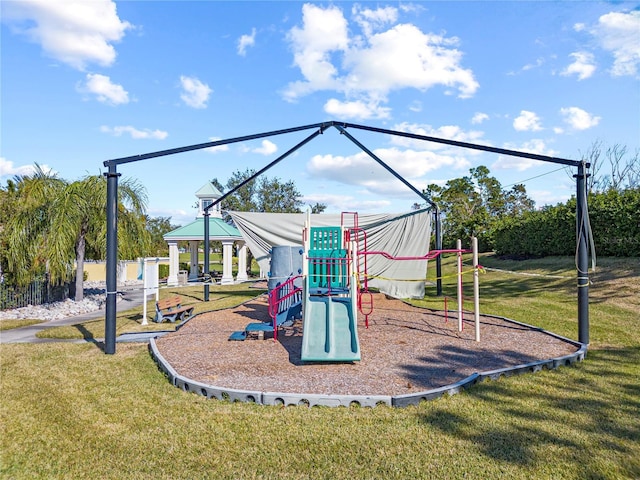 view of jungle gym featuring a yard