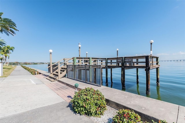 dock area featuring a water view