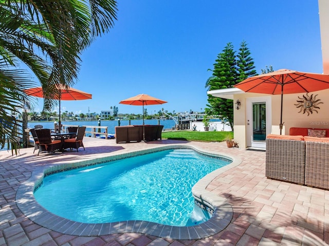 16126 4th St E, Redington Beach, FL 33708 - outdoor pool featuring a patio, an outdoor hangout area, and a water view