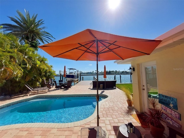 16126 4th St E, Redington Beach, FL 33708 - swimming pool featuring a patio area and a water view