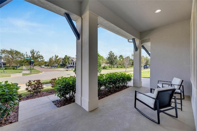 view of patio featuring a porch