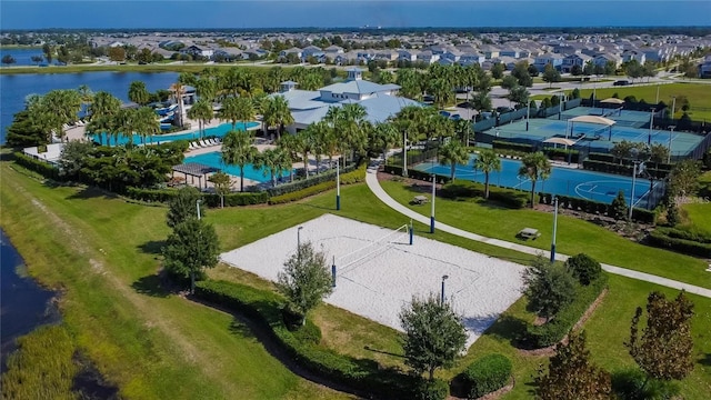 birds eye view of property with a water view